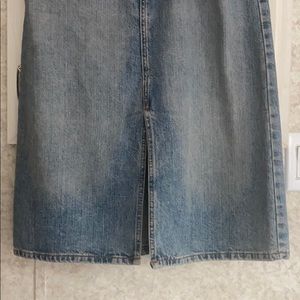 Like new, fits good,fancy,Jean skirt with cut.